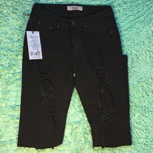 Ripped black skinny jeans